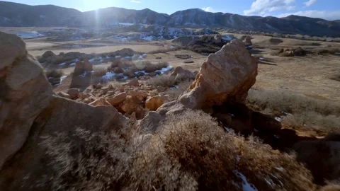 Racing drone flying quickly through red rocks 5 動画素材 148247305