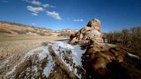 Racing drone flying quickly through red rocks 3 動画素材 148247486