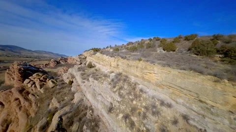 Racing drone flying quickly through red rocks 7 動画素材 148247786