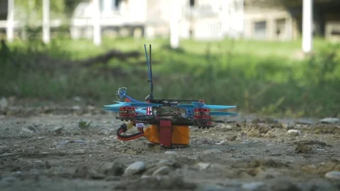Racing drone taking off in slow motion Stock Footage 78628138