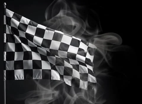 Racing flag with black and white checkers in smoke on dark background Foto stock