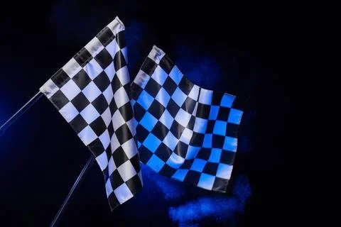 Racing flags on dark blue background Stock Photos