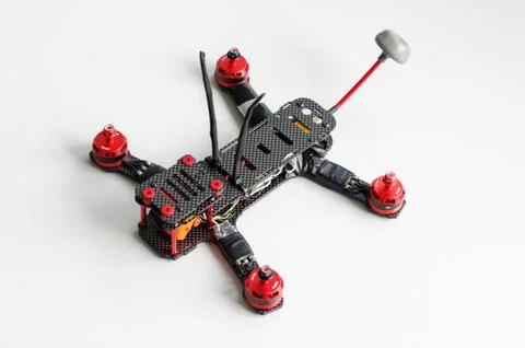 Racing quadcopter isolated on the white background Stock Photos