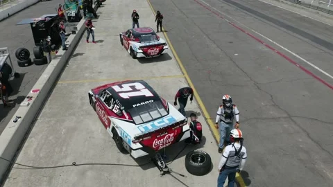 Racing team working at pit stop, formula 1. NASCAR Stock Footage 190068277
