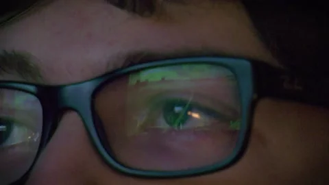 Racing video game reflection on glasses closeup Stock Footage 140477266