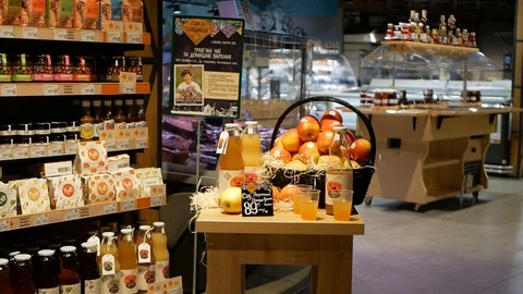 Rack with apples and Apple juice at the supermarket. Natural product Video stock 100556743