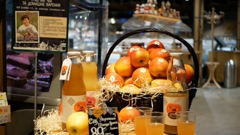 Rack with apples and Apple juice at the supermarket. Natural product Stock Footage 100556751