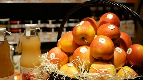 Rack with apples and Apple juice at the supermarket. Natural product Video stock 100556784