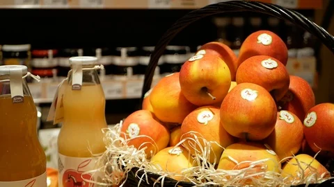 Rack with apples and Apple juice at the supermarket. Natural product Video stock 100556812