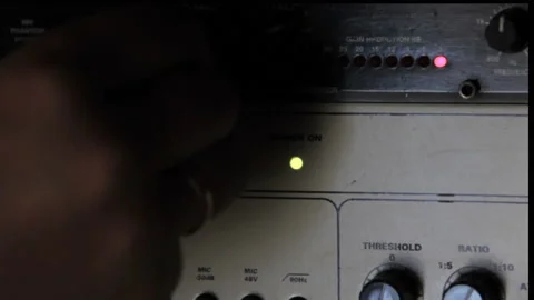 A rack of audio compressors in a recording studio. Video stock 123379204