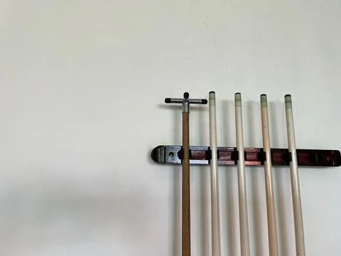 Rack of billiards on a white background. Billiards equipment Stock Photos