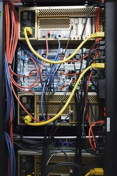 Rack, cables and computing equipment in server room for database storage, c.. 写真素材