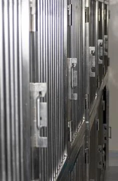A rack of cages for animals Stock Photos