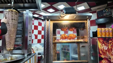 A rack of chicken is cooking in an oven Видео 315547647