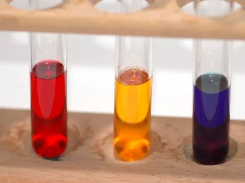 Rack of colourful test tubes Stock Photos