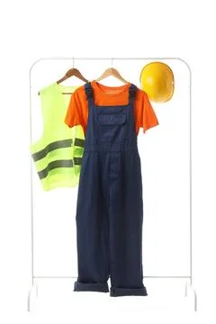 Rack with construction worker's uniform on white background Stock Photos