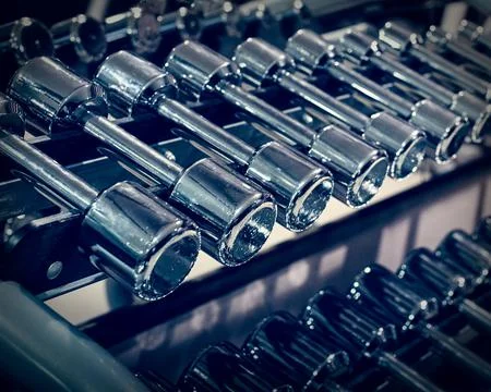 Rack with different dumbbells Foto stock