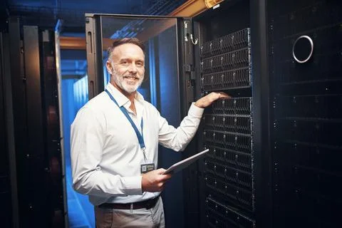 Rack, engineer or portrait with tablet in server room for hardware inspecti.. Stock Photos