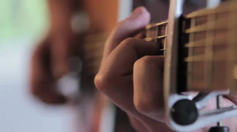 Rack focus of a acoustic guitar Video stock 25852439