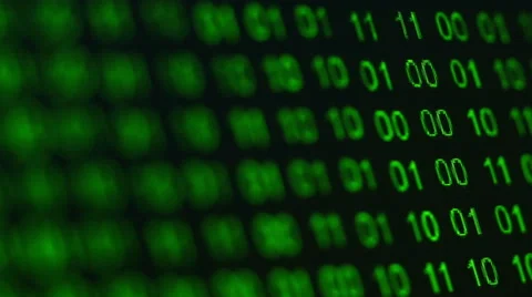 Rack focus across binary code scrolling on computer Stock Footage 51429485