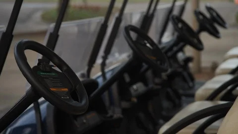 Rack Focus across Golf Carts 1 Stock Footage 108321536