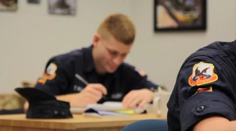 Rack Focus from Arm Patch to Student in Background Stock Footage 40700869