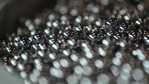 Rack focus on ball bearings Stock Footage 311089578