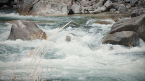 Rack Focus of Beautiful, Turquoise, River Rapids Stock Footage 90870232