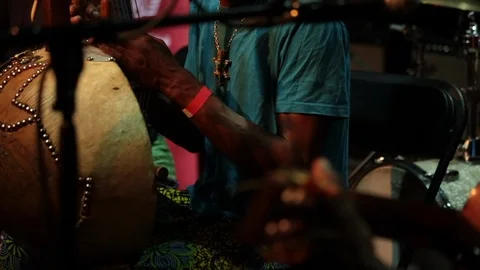 Rack focus between African guitar and kora player on stage during music concert Stock-Footage 98722946
