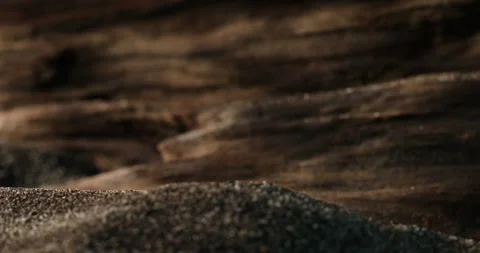 Rack focus between Sand and aged wood texture. Stock Footage 271322419