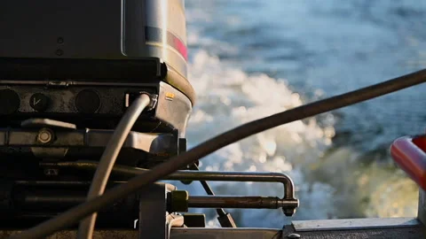 Rack focus from boat engine to wake Stockbeeldmateriaal 130544722