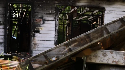Rack Focus to Burnt House Stock Footage 89287481