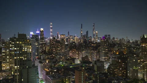 Rack Focus Cityscape Timelapse Night Zoom Out Stock Footage 242596916