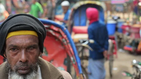 Rack Focus Close Up Portrait Driver Cycle Rickshaws Dhaka Road Traditional Stock Footage 339078784