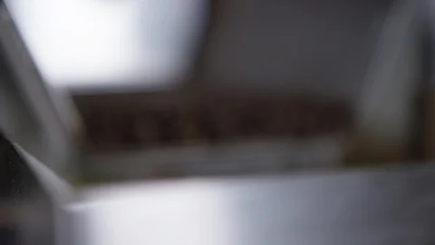 Rack focus to coffee beans in factory for packing Stock Footage 94383563