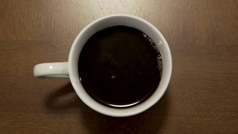 Rack Focus to Coffee in Mug Video stock 76909813