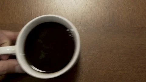 Rack Focus to Coffee Mug then Remove 動画素材 76909565