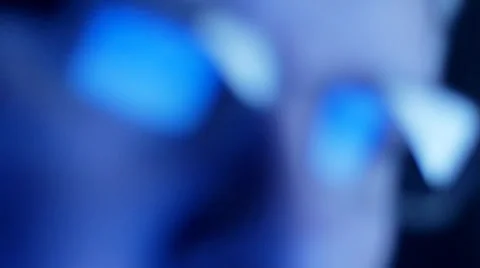 Rack focus to computer screen and code reflected in man's glasses Stock Footage 33896748