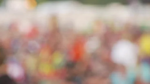 Rack focus from crowd to kid Stock Footage 520627