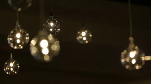 Rack focus defocus on decorative lighting in stylish home C Stock Footage 120407545