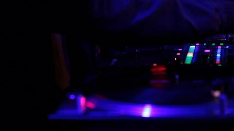 Rack focus of DJ decks in night club Stock Footage 98743181