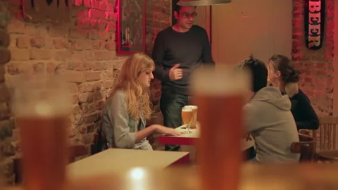 Rack Focus Draft Beer People Chatting Inside Cozy Bar Stock Footage 344295972