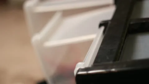 Rack focus drawer laying on floor Video stock 10902897