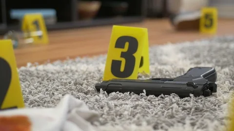 Rack Focus of Evidence at Interior Crime Scene Vídeo Stock 84180377