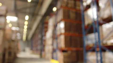 Rack Focus Into a Filled Logistics Warehouse Stock Footage 82869858