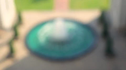 Rack focus of Fountain in Office Complex during the afternoon Stock Footage 124650190