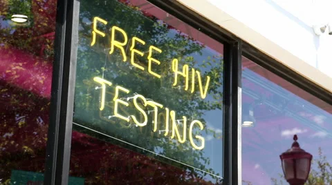 Rack Focus on Free HIV Testing Sign in Dallas Texas Stock Footage 51552831