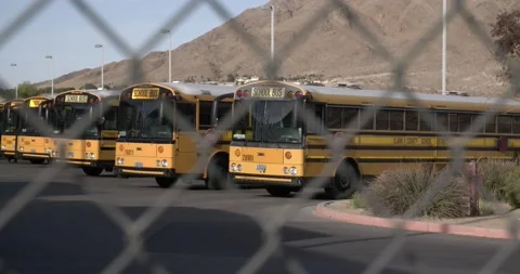 Rack Focus From Gate to School Bus Stock Footage 154331590