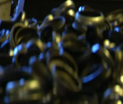 Rack focus of generic-looking metal parts Stock Footage 21626757