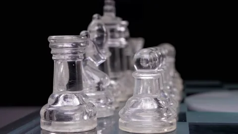 Rack focus glass chess board game 4k Video stock 150603658